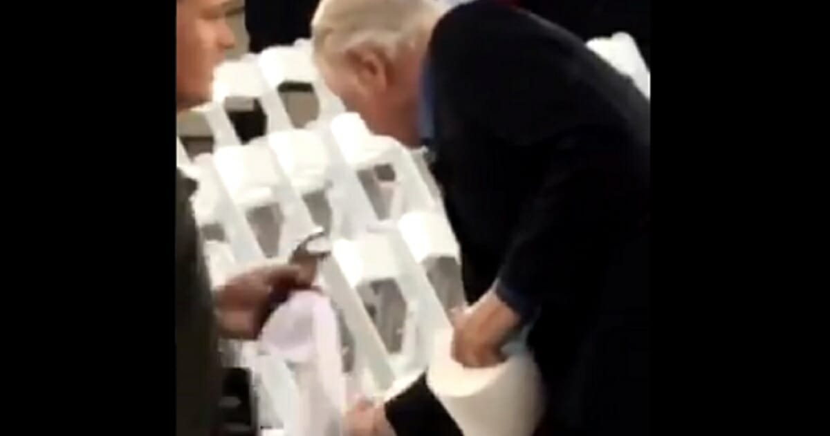 Oscar-winning actor Jon Voight dries seats for Gold Star families before last week's Fourth of July ceremonies in Washington.