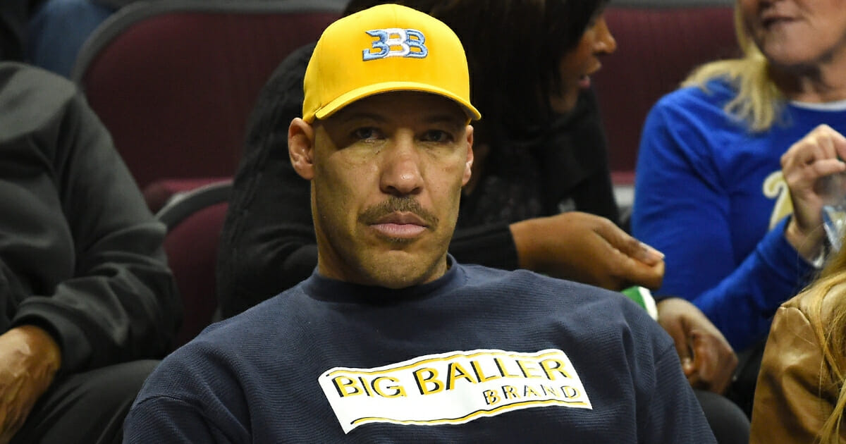 LaVar Ball sports Big Baller Brand attire while watching son Lonzo play for the UCLA Bruins.
