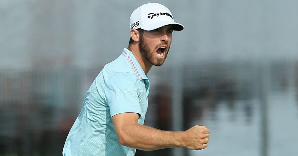Matthew Wolff celebrates after an eagle putt on the 18th green to win the 3M Open.