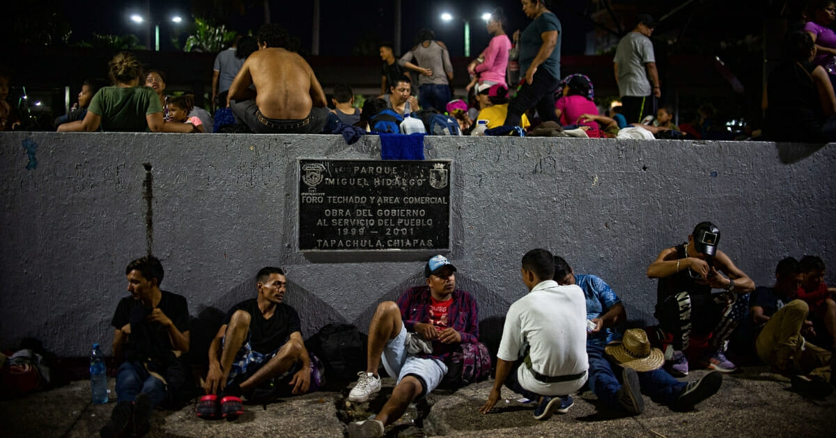 Central American migrants heading in caravan to the United States rest at park in Tapachula, Mexico.