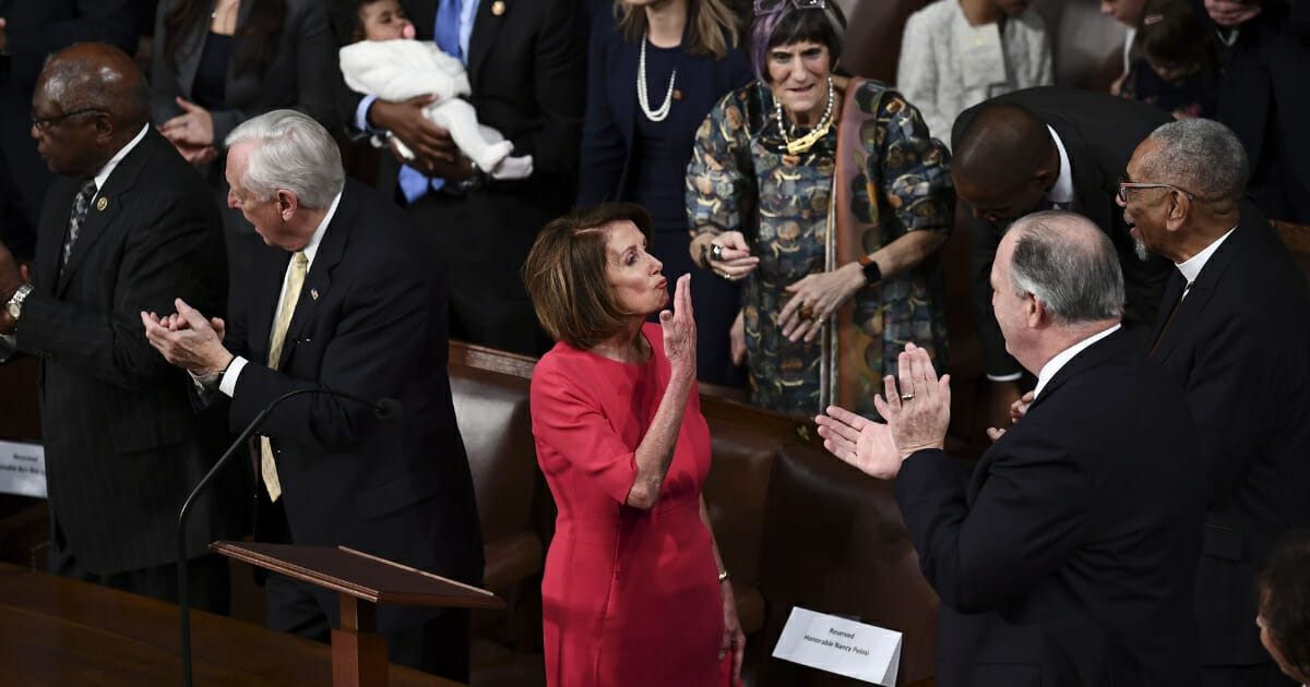 Incoming Speaker of the House Nancy Pelosi blows a kiss as she receives applause at the start of the 116th Congress and swearing-in ceremony on the floor of the House of Representatives at the U.S. Capitol on Jan. 3, 2019 in Washington, D.C.