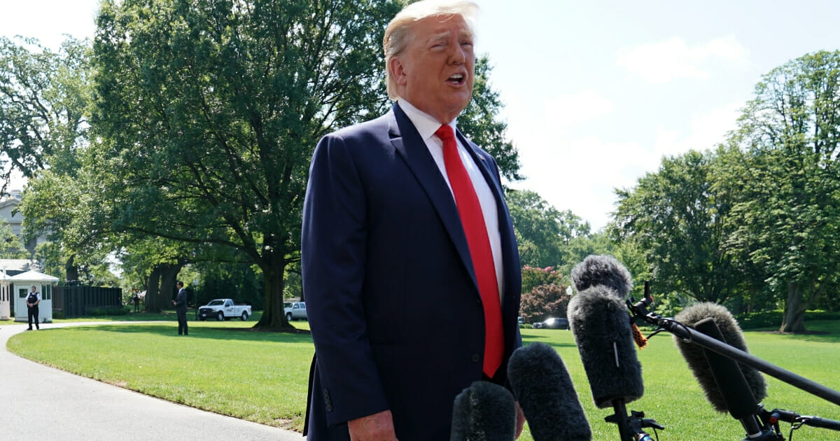 President Donald Trump speaks to members of the media prior to his departure from the White House on July 5, 2019 in Washington, D.C.