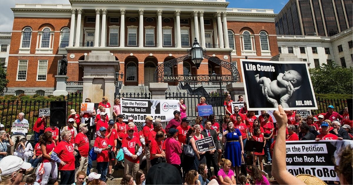 Members of Massachusetts Citizens for Life hold a rally outside the Massachusetts Statehouse on June 17, 2019, in Boston, Massachusetts.