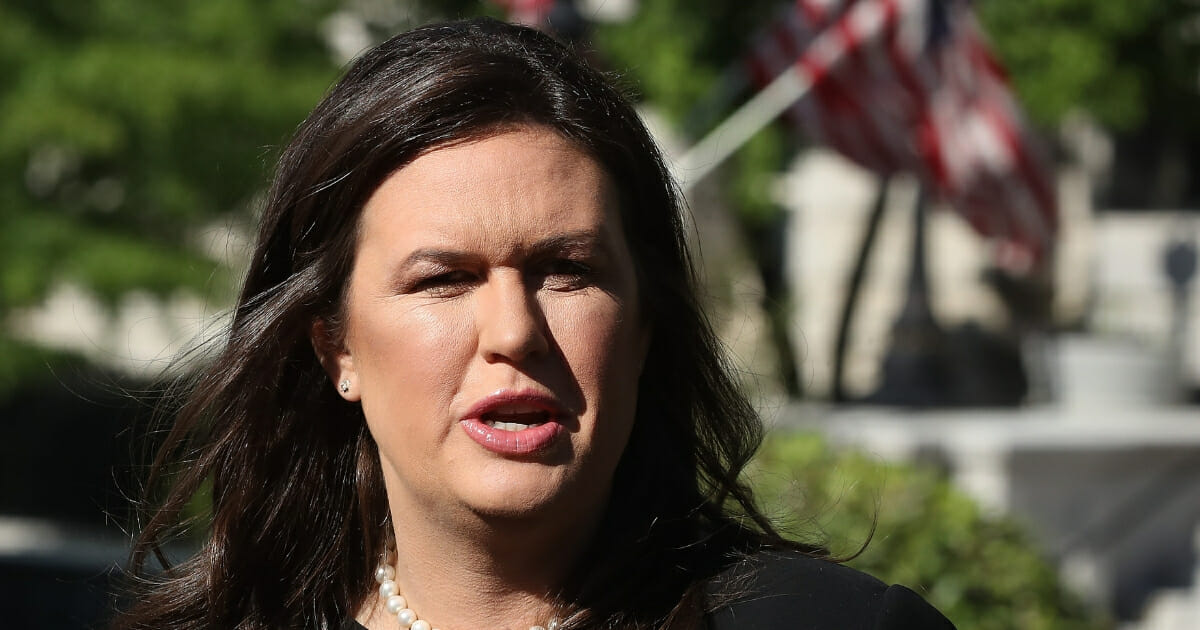 Then-White House press secretary Sarah Sanders talks to reporters after an interview with FOX News outside the West Wing on June 11, 2019 in Washington, D.C
