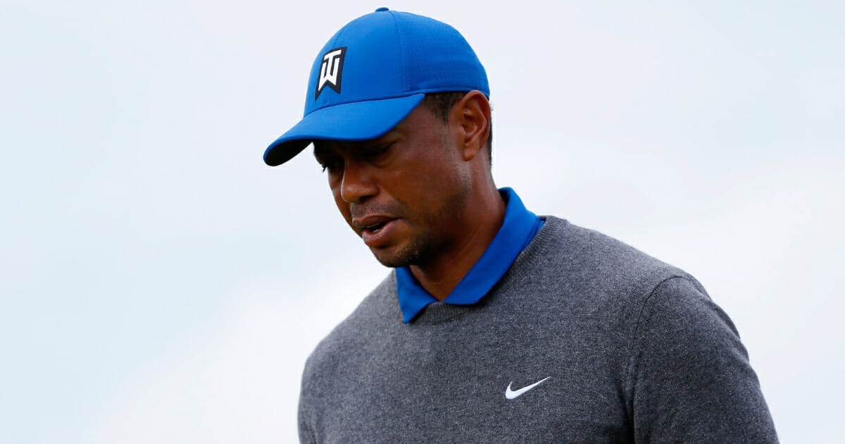 Tiger Woods walks off the sixth hole during the first round of the British Open at Royal Portrush Golf Club in Northern Ireland.