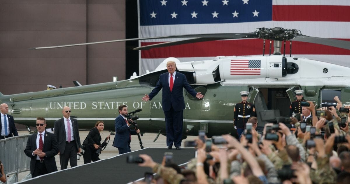 President Donald Trump arrives to speak to military personnel and their families stationed in South Korea at Osan Air Base on June 30, 2019.