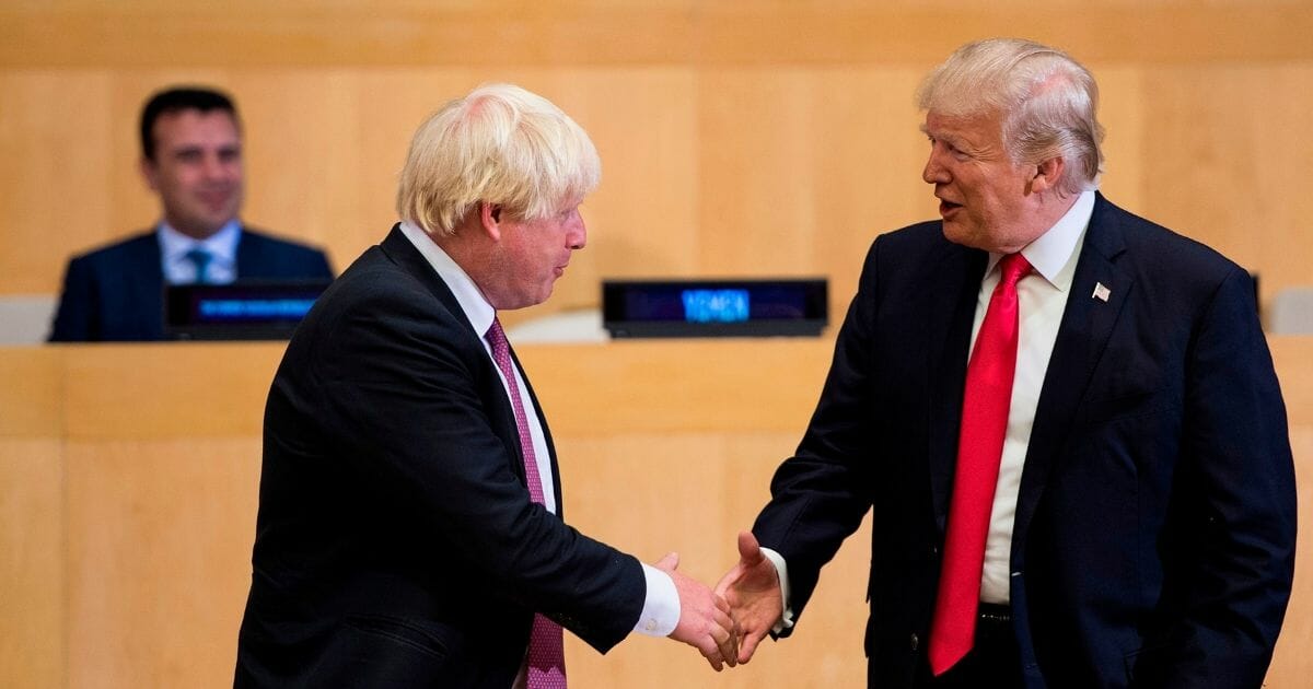 Incoming British Prime Minister Boris Johnson shakes hands with President Donald Trump at the United Nations in 2017.