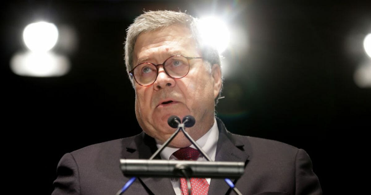 U.S. Attorney General William Barr delivers remarks during the National Police Week 31st Annual Candlelight Vigil on May 13, 2019, in Washington, D.C.