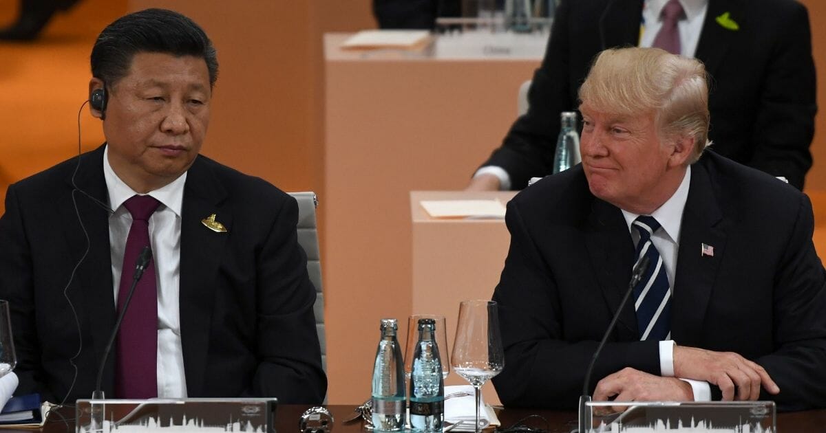 Chinese President Xi Jinping, left, and U.S. President Donald Trump attend a working session during the G20 summit in Hamburg, Germany, on July 7, 2017.