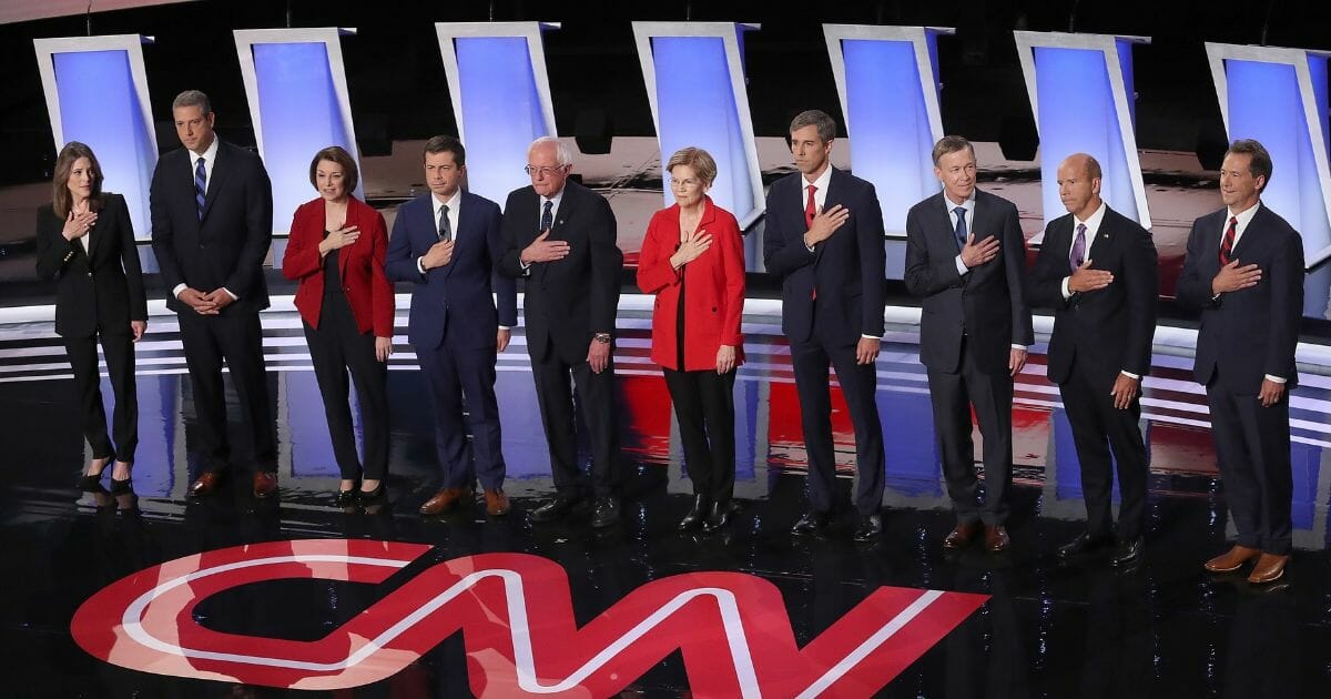 Democratic presidential candidates take the stage at the beginning of the Democratic Presidential Debate at the Fox Theatre July 30, 2019 in Detroit, Michigan.