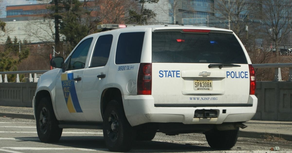 State police vehicle on highway.