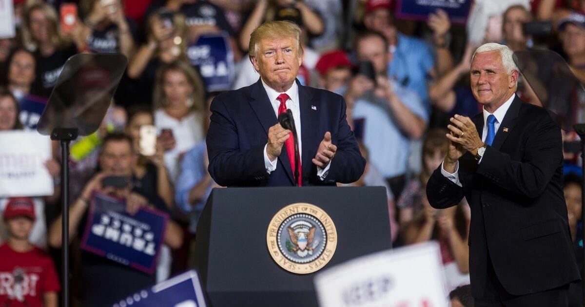 President Donald Trump takes the podium before speaking during a Keep America Great rally on July 17, 2019 in Greenville, North Carolina.