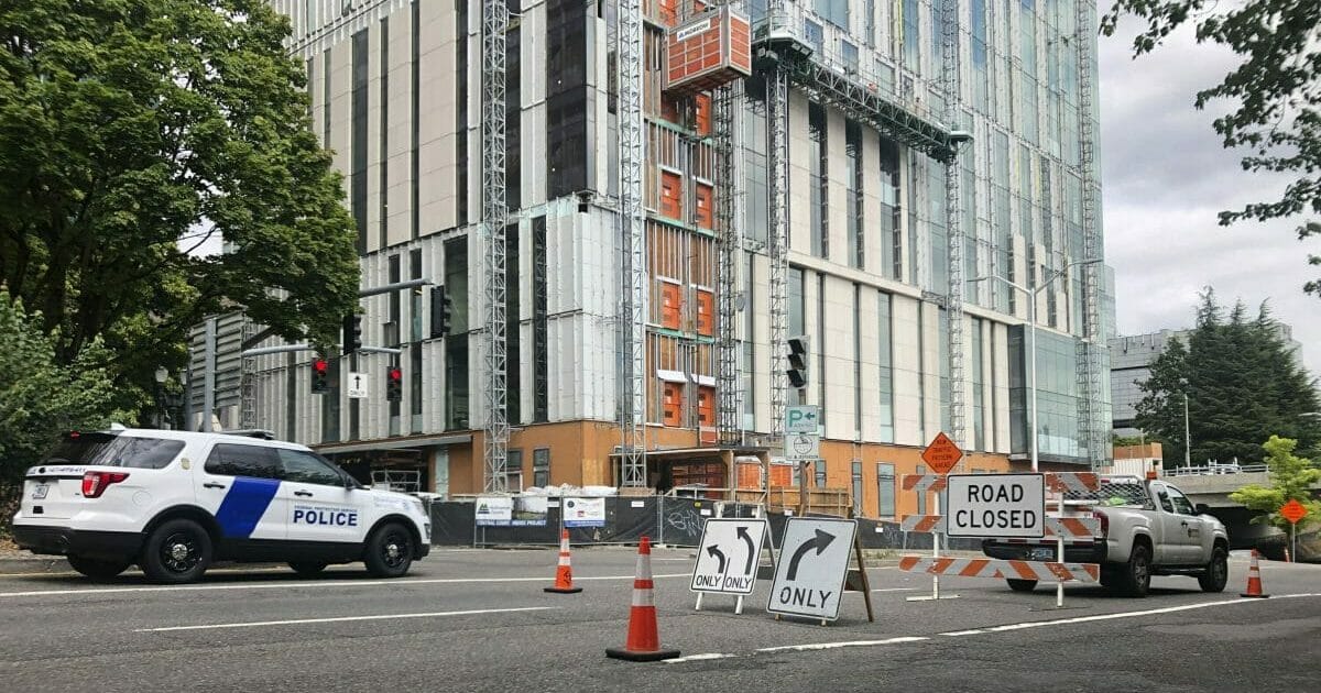 A road closure sign is seen in downtown Portland, Oregon, Aug. 16, 2019, in advance of a rally as the city prepares for crowds.