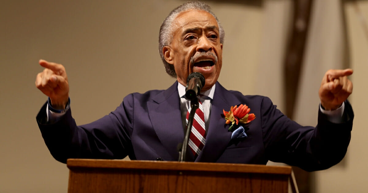 The Rev. Al Sharpton speaks to parishioners at the Greater St. Marks Family Church as the community seeks answers about the police shooting of Michael Brown on Aug. 17, 2014, in Ferguson, Missouri.