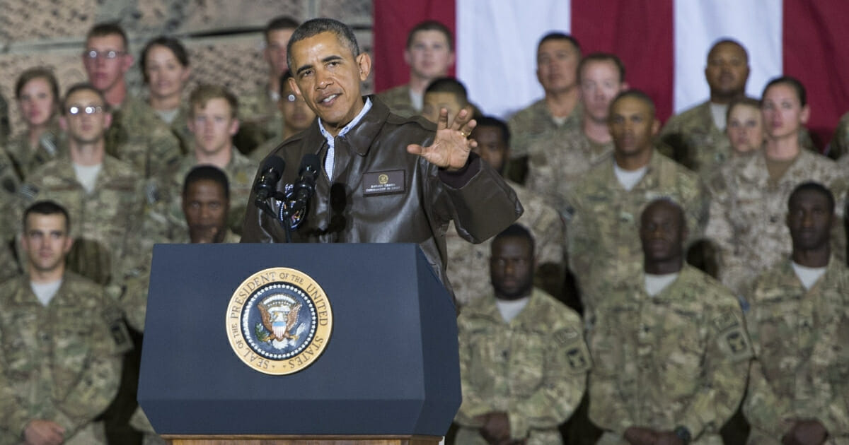 Then-President Barack Obama speaks during a surprise visit with U.S. troops at Bagram Air Field, north of Kabul, in Afghanistan, on May 25, 2014, prior to the Memorial Day holiday.
