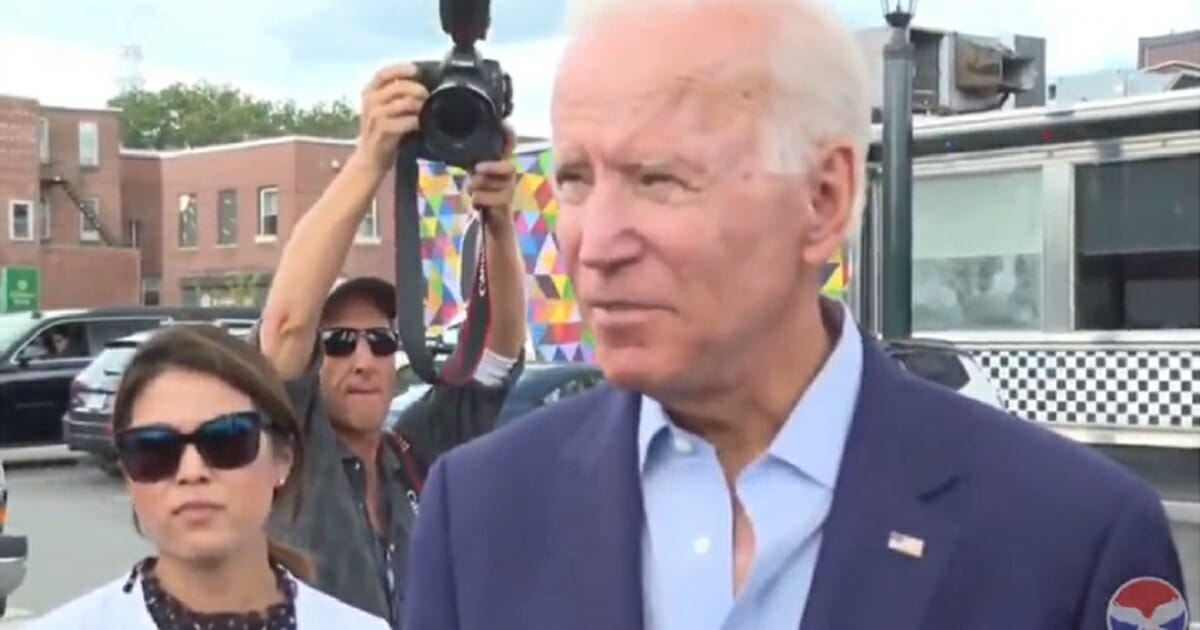 Former Vice President Joe Biden talks to reporters in Keene, New Hampshire, on Saturday.