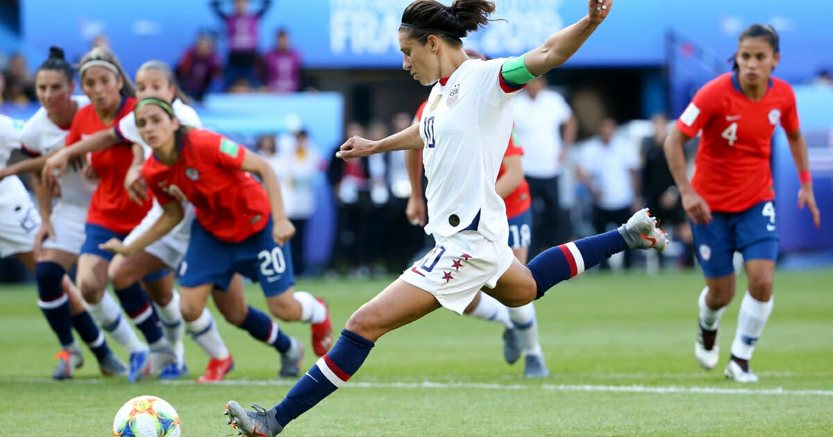 Carli Lloyd of the U.S. women's soccer team attempts a penalty kick during a World Cup match against Chile.