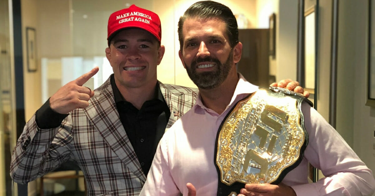 UFC star Colby Covington, left, with the president's eldest son, Donald Trump Jr.