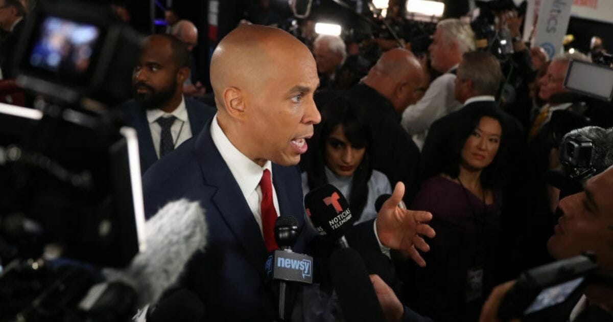 Democratic presidential candidate Sen. Cory Booker speaks to the media at the Fox Theatre on July 31, 2019, in Detroit, Mich.