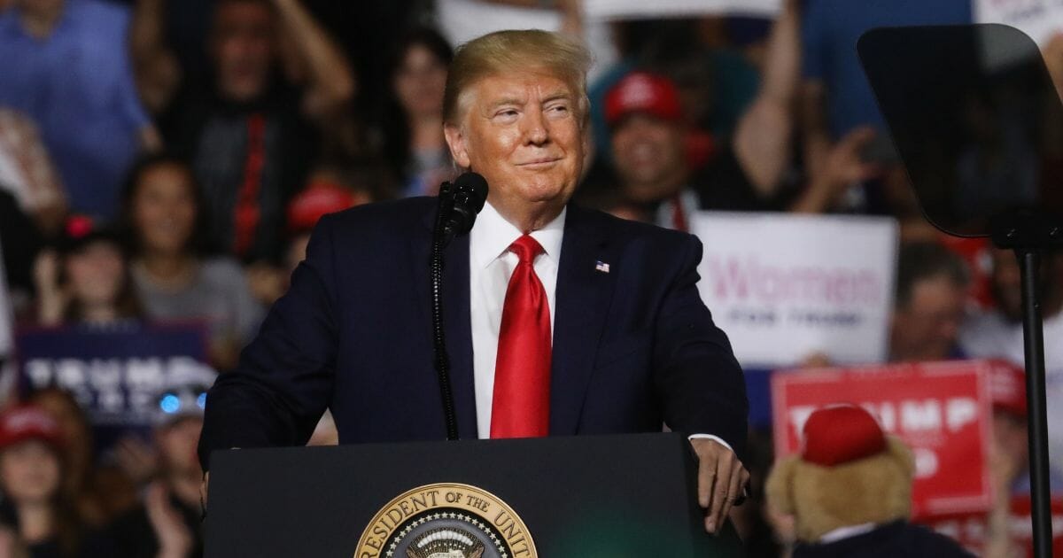 President Donald Trump speaks to supporters at a rally in Manchester on Aug. 15, 2019, in Manchester, New Hampshire.