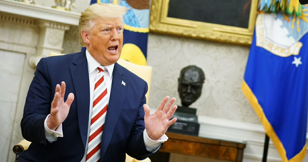 President Donald Trump speaks in the Oval Office of the White House in Washington, D.C., on Aug. 20, 2019.