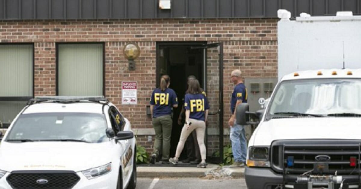 FBI agents on the scene of a raid in South Bend, Indiana.