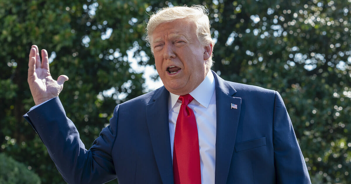 President Donald Trump speaks to members of the press before departing from the White House on the south lawn before he boards Marine One on Aug. 9, 2019, in Washington, D.C. Donald Trump spoke to reporters about gun background checks and the escalation of the US-China trade war.