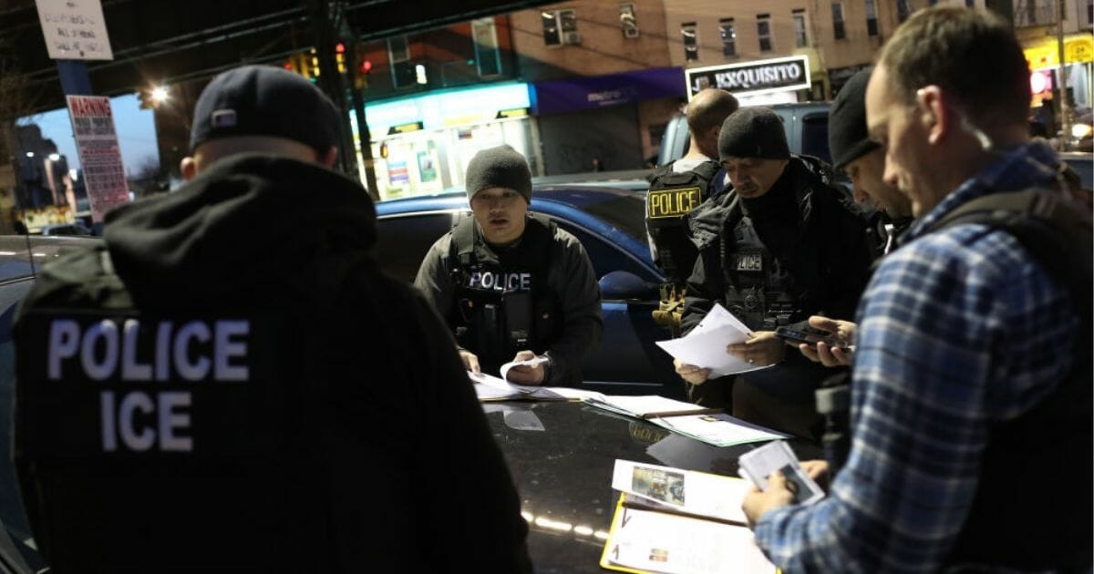 U.S. Immigration and Customs Enforcement officers prepare for operations to arrest undocumented immigrants on April 11, 2018, in New York City.