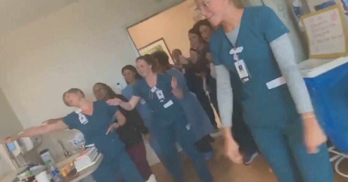 Nurses sing Backstreet Boys hits to a mother of four who is battling leukemia.