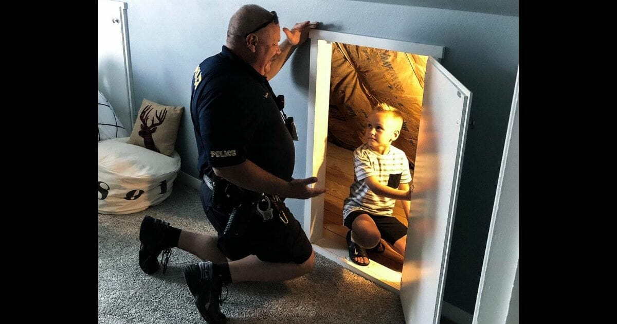 A police officer assures a young boy that there are no monsters in his closet.