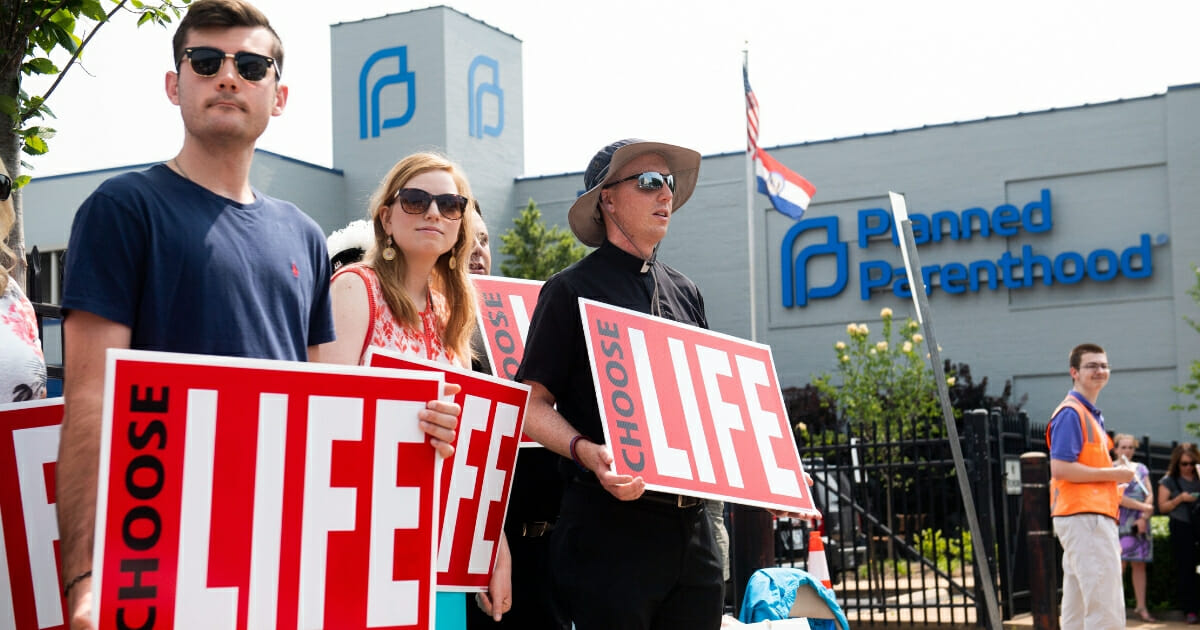 Pro-life demonstrators hold a protest outside the Planned Parenthood clinic in St. Louis, Missouri, on May 31, 2019.