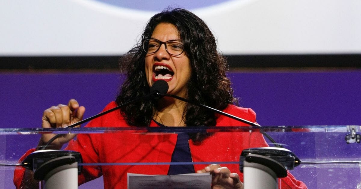 Rep. Rashida Tlaib (D-MI) speaks at the opening plenary session of the NAACP 110th National Convention at COBO Center on July 22, 2019, in Detroit, Michigan.