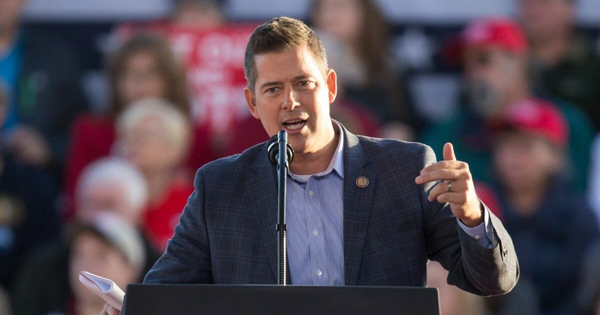 U.S. Rep. Sean Duffy (R-Wis.) talks to the crowd before U.S. President Donald Trump makes an appearance at a rally on October 24, 2018 in Mosinee, Wisconsin.