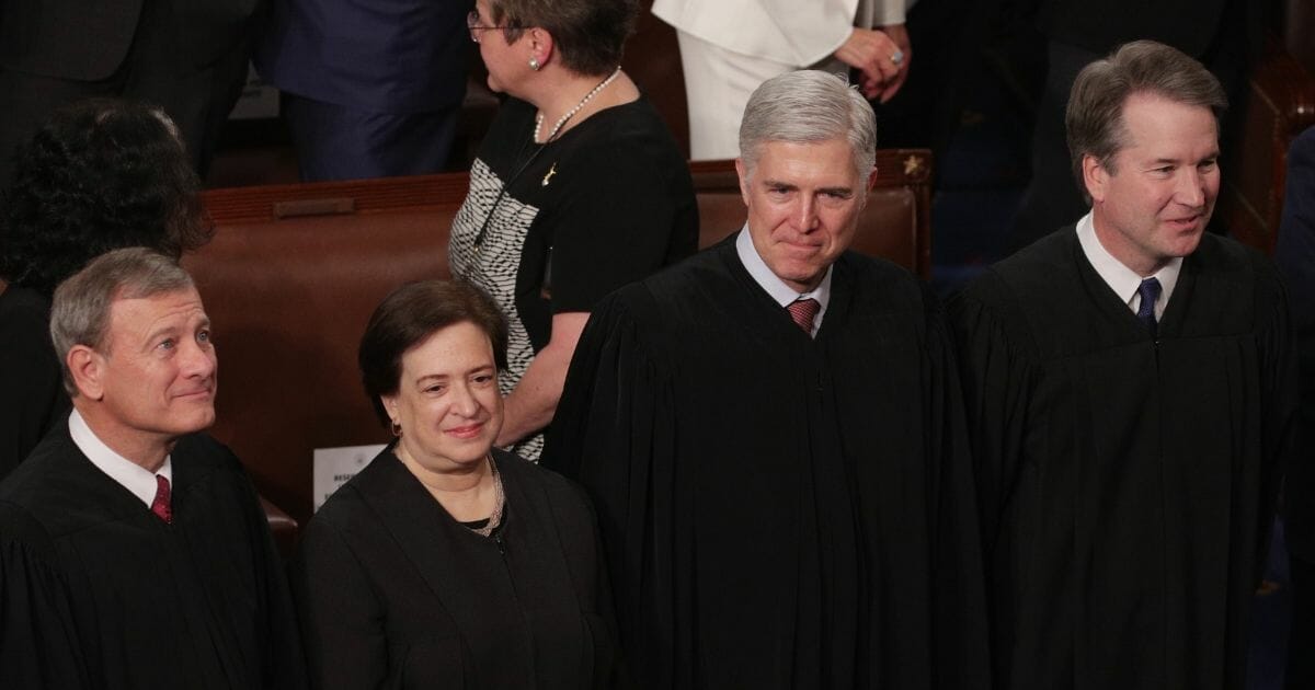 Supreme Court Justices John Roberts, Elena Kagan, Neil Gorsuch and Brett Kavanaugh observe as President Donald Trump delivers the State of the Union address on Feb. 5, 2019, in Washington, D.C.