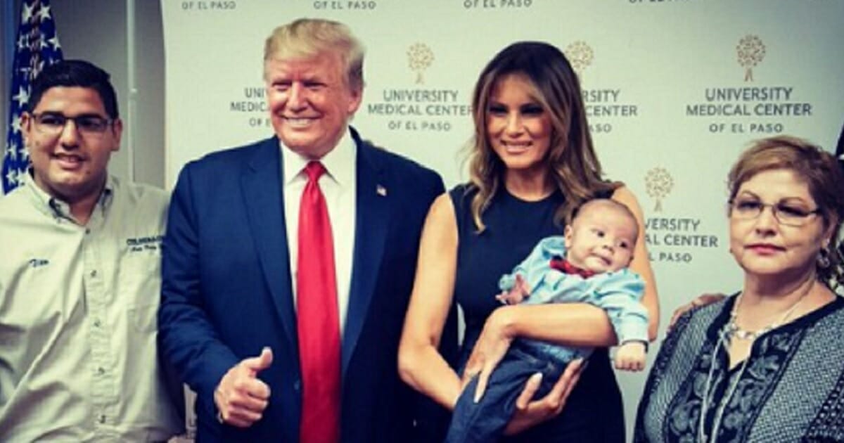 President Donald Trump and first lady Melania Trump visit El Paso, Texas, on Wednesday, where they met a baby orphaned by Saturday's mass shooting.