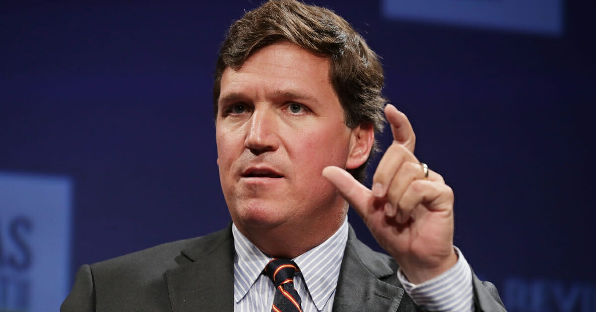 Fox News host Tucker Carlson discusses 'Populism and the Right' during the National Review Institute's Ideas Summit at the Mandarin Oriental Hotel on March 29, 2019 in Washington, D.C.