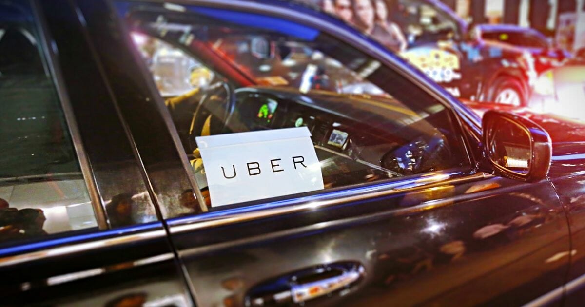 When the teen got into the car, the driver allegedly decided to cancel her route and try to take her to his apartment. Pictured above: a stock photo of a car with Uber signage on the window.