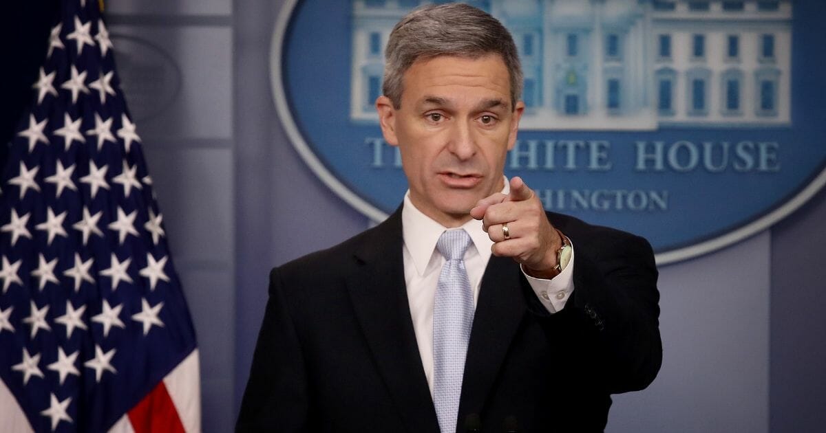 Ken Cuccinelli, acting director of U.S. Citizenship and Immigration Services, fields questions Monday about new rules that will limit immigrants eligibility for green cards if they are unable to support themselves.