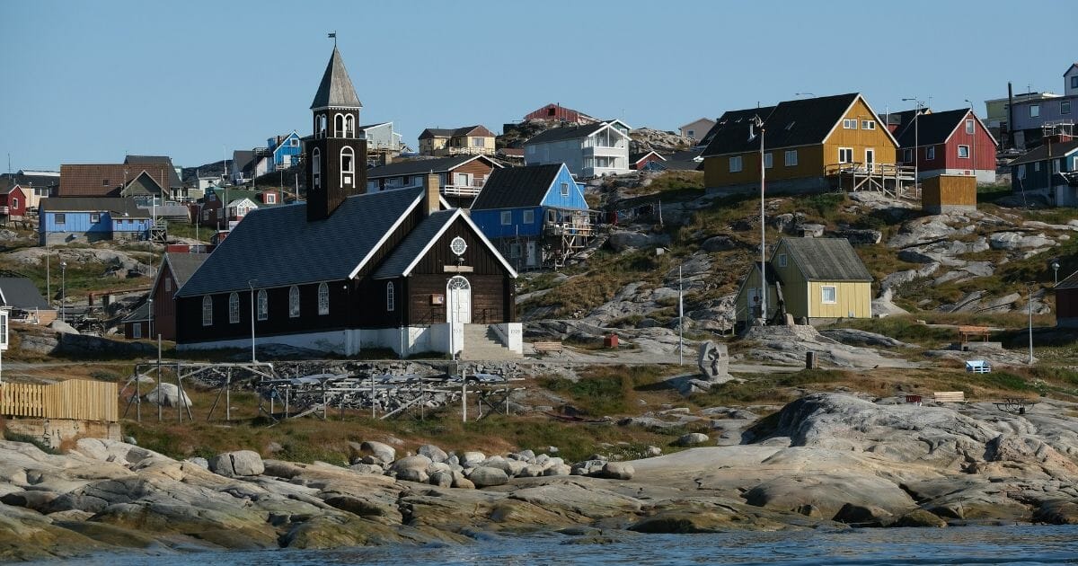 Zion Lutheran Church, built in 1779, stands on Disko Bay in Ilulissat, Greenland