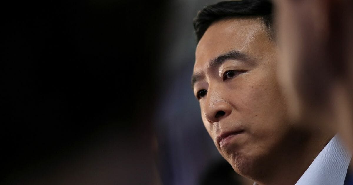 Democratic presidential candidate Andrew Yang speaks to the media after the July 31 Democratic presidential debate in Detroit