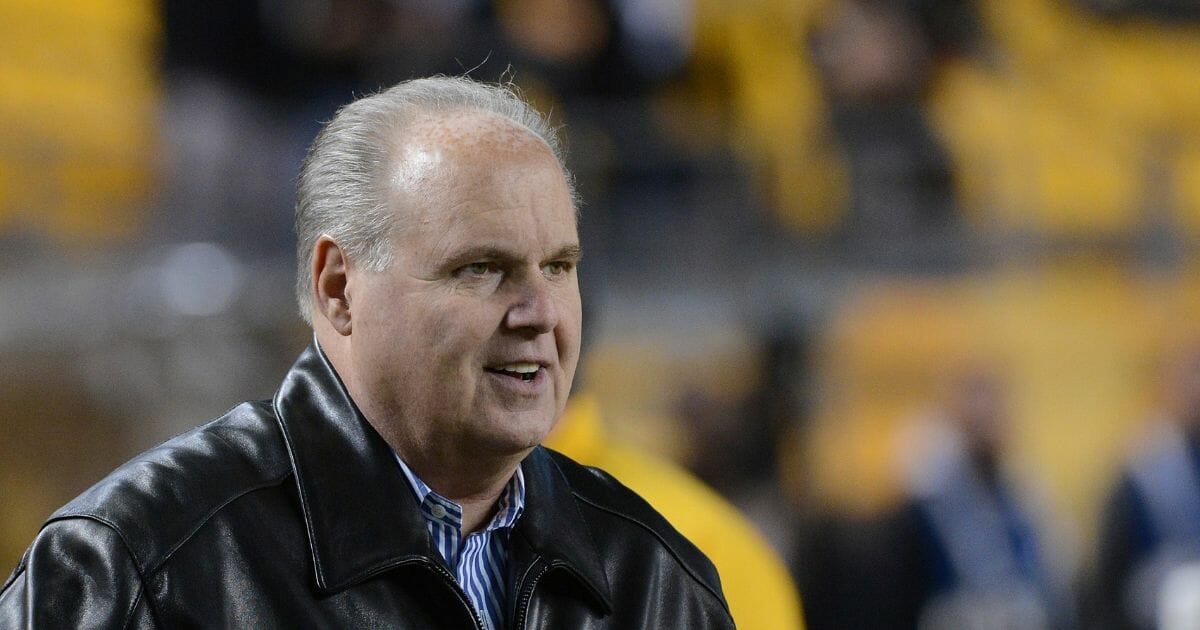 Radio show host Rush Limbaugh on the sidelines at a National Football League game between the Baltimore Ravens and Pittsburgh Steelers at Heinz Field in Pittsburgh