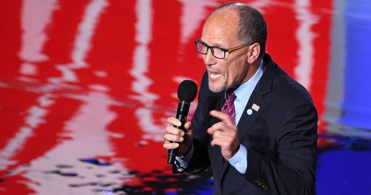 Democratic National Committee Chairman Tom Perez warms up the crowd before the Democratic primary debate in Detroit on July 31.