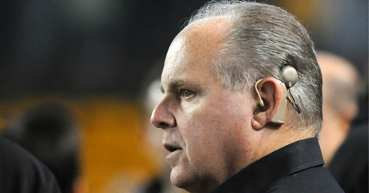 Radio talk show host and political commentator Rush Limbaugh looks on from the sideline before a National Football League game between the New England Patriots and Pittsburgh Steelers at Heinz Field on Nov. 14, 2010, in Pittsburgh, Pennsylvania.