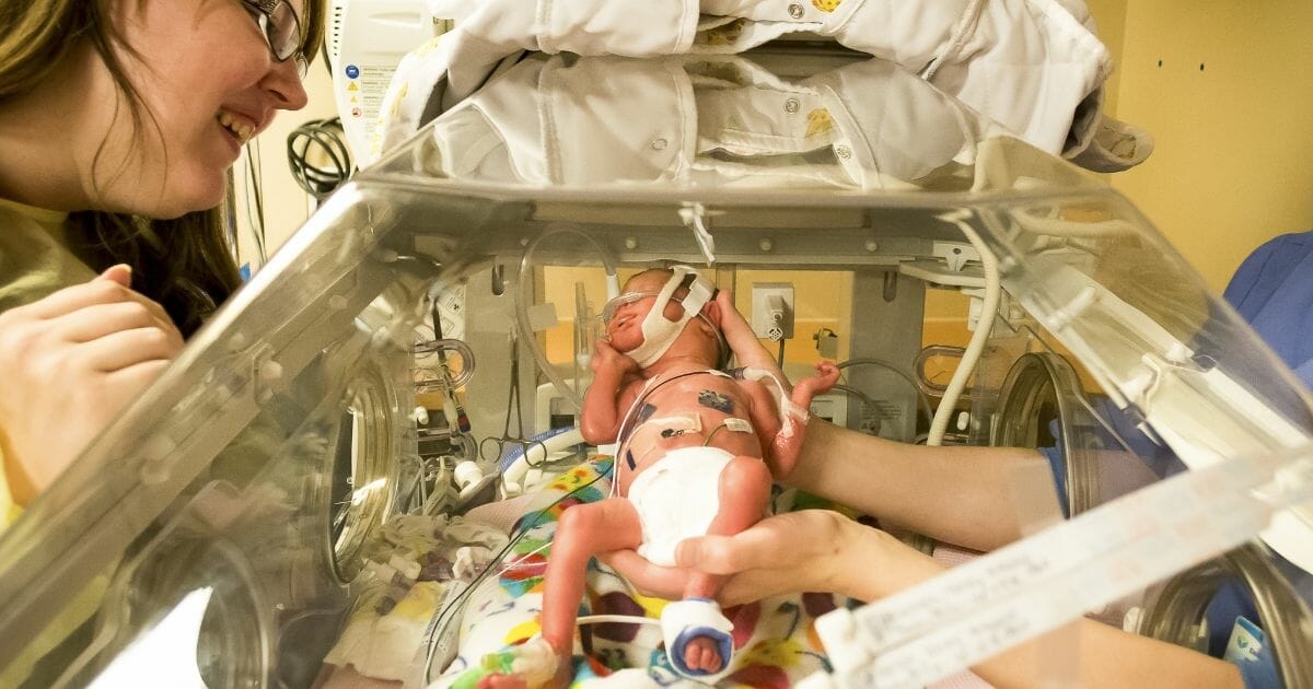 Stock image of a premature baby being cared for.