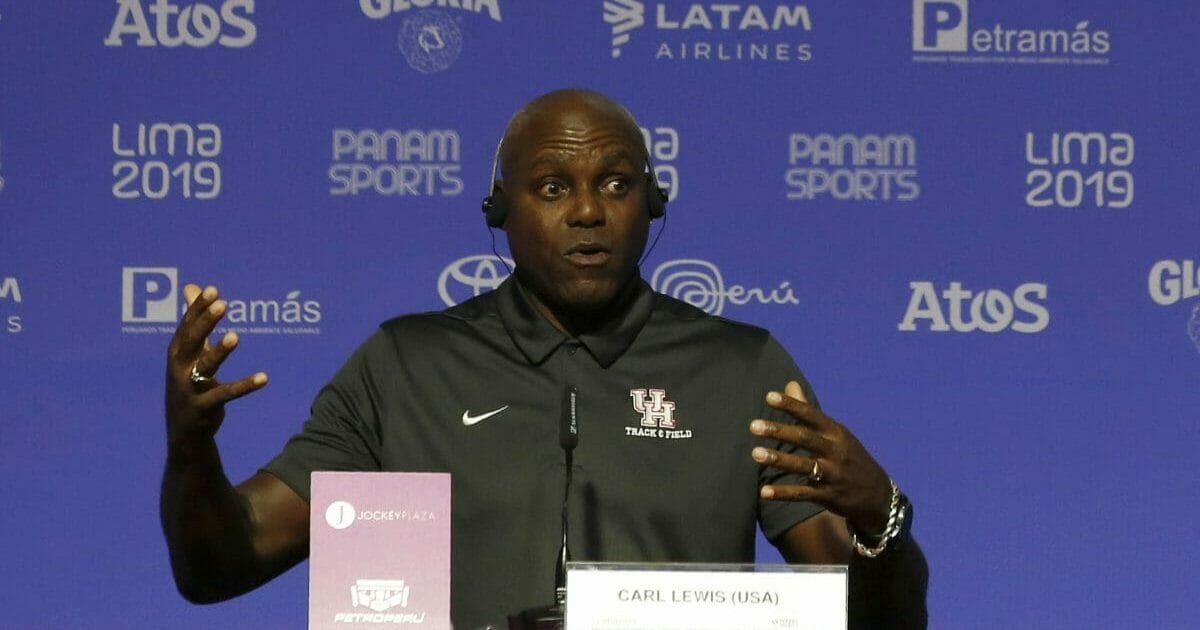 Nine-time Olympic gold medalist Carl Lewis, from the United States, speaks during a press conference during the Pan American Games in Lima, Peru, Monday, Aug. 5, 2019.