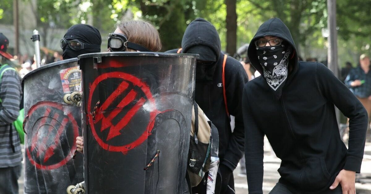 Police clash with demonstrators as they try to clear 'Antifa' members and anti-Trump protesters from the area during a protest on June 4, 2017, in Portland, Oregon.