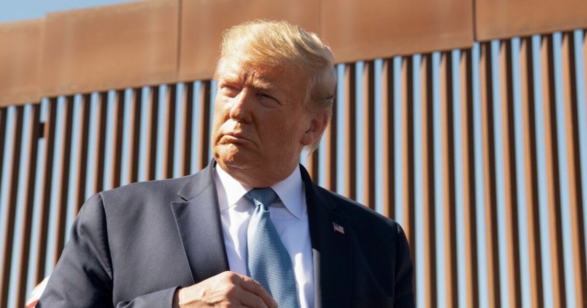 President Donald Trump visits the US-Mexico border fence in Otay Mesa, California, on Sept. 18, 2019.