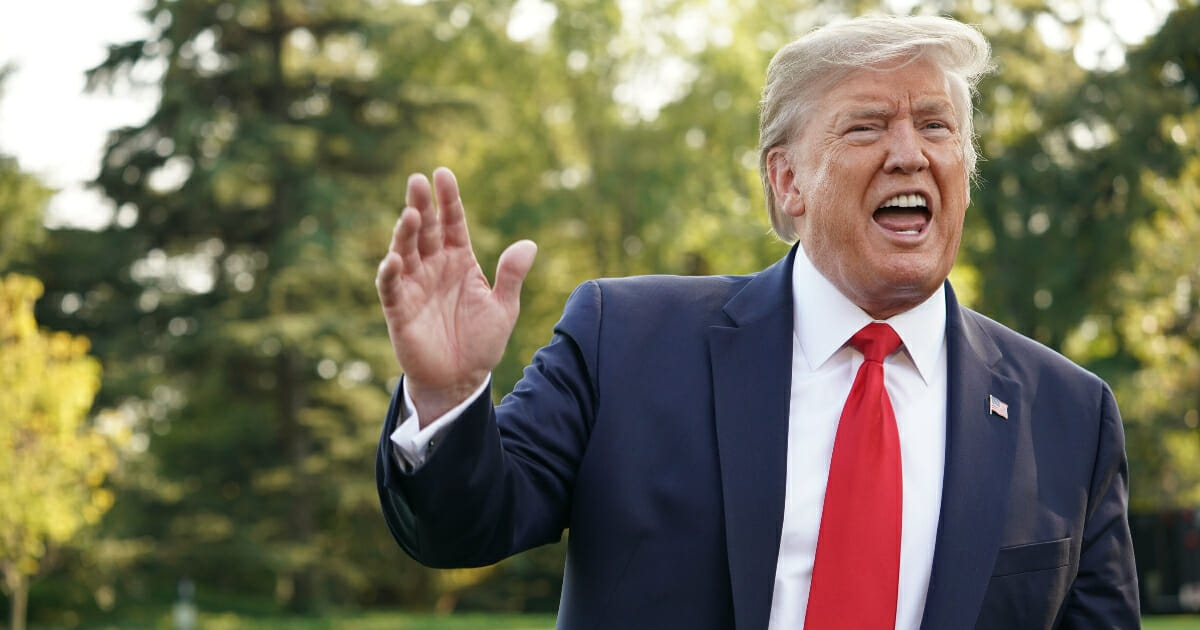 President Donald Trump talks to journalists as he departs the White House on Sept. 16, 2019, in Washington, D.C.