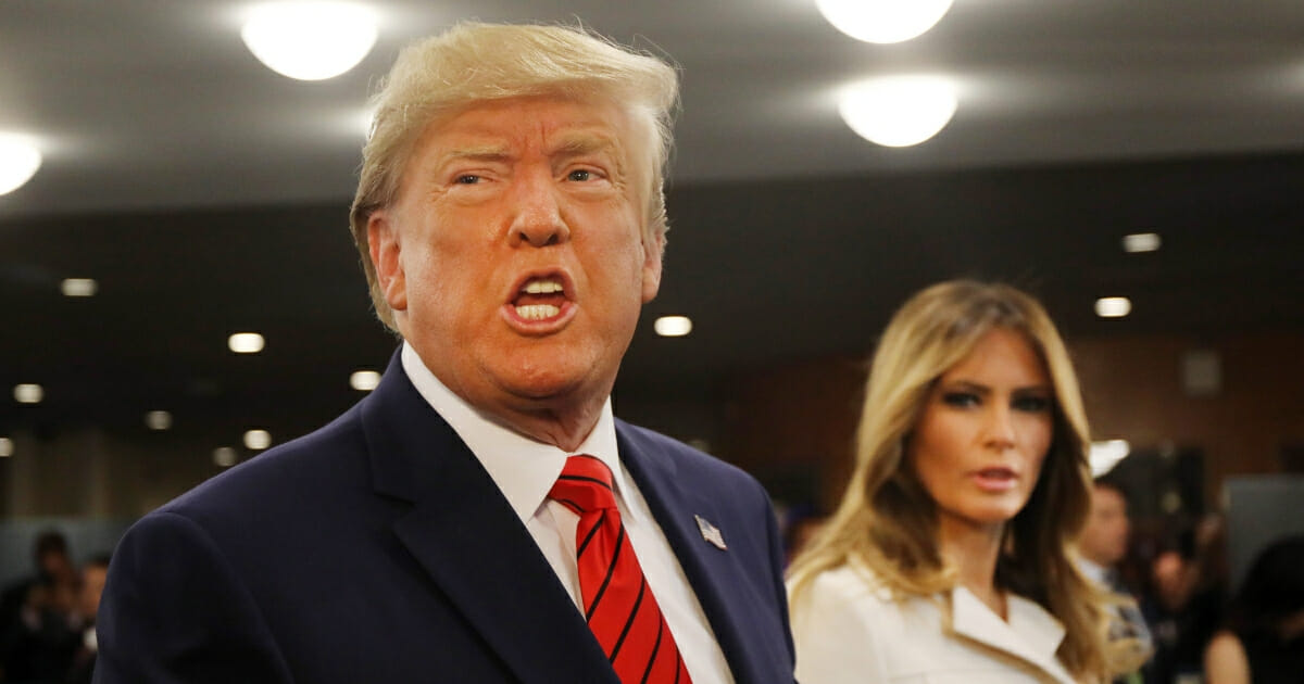 President Donald Trump, accompanied by first lady Melania Trump, speaks to the media at the United Nations General Assembly on Sept. 24, 2019, in New York City.