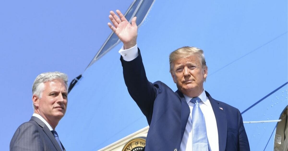 President Donald Trump (Right) waves next to new national security adviser Robert O'Brien on Sept. 18, 2019, at Los Angeles International Airport in Los Angeles, California.